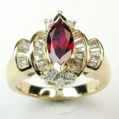 CR RUBY RING WITH 1/2 CARAT DIAMONDS IN 14K GOLD  